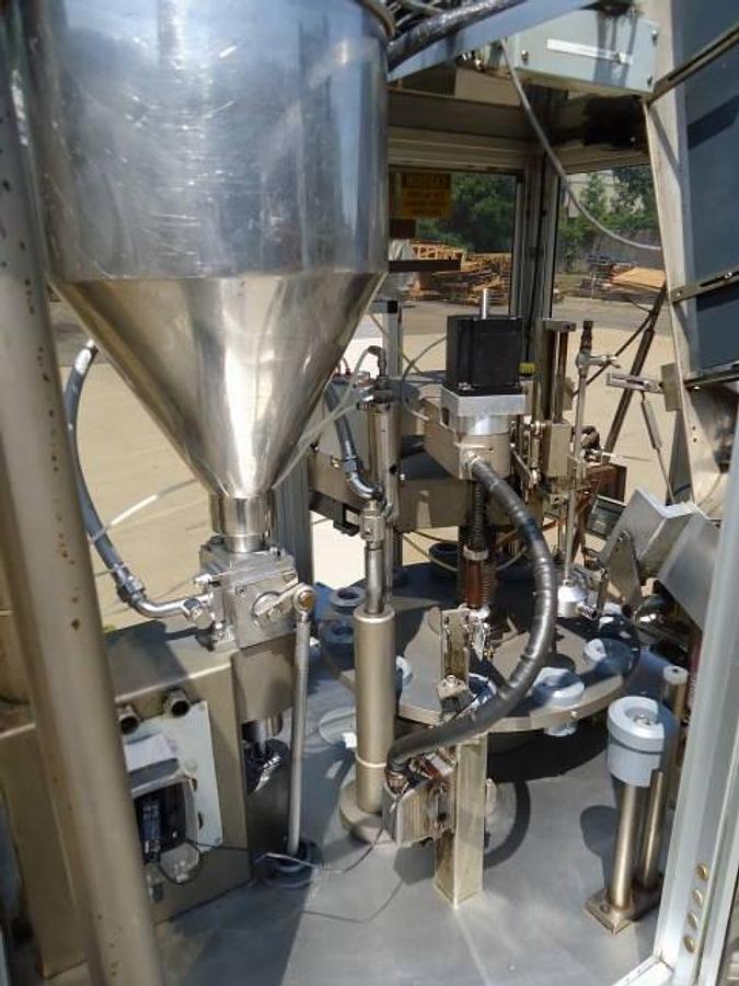 Used Comadis C100 automatic tube filler/sealer, high frequency sealing