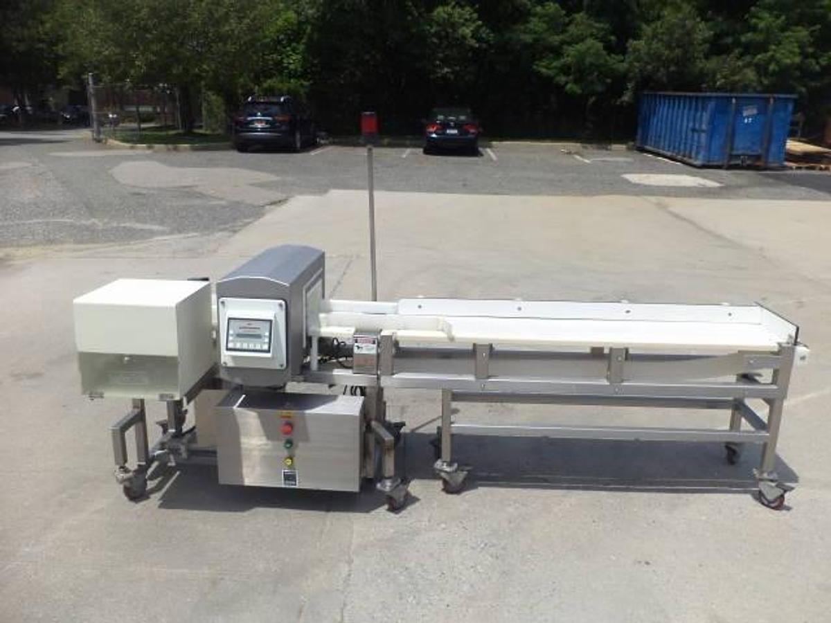 Used Safeline conveyorized metal detector, stainless steel