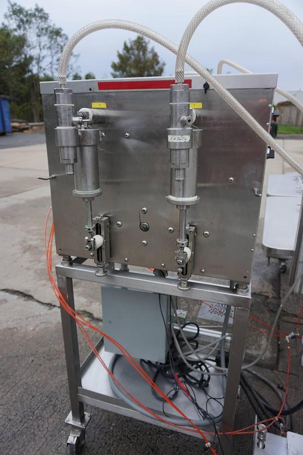 Used Filling Equipment Company Four Head Piston Filler with Carousel Conveyor