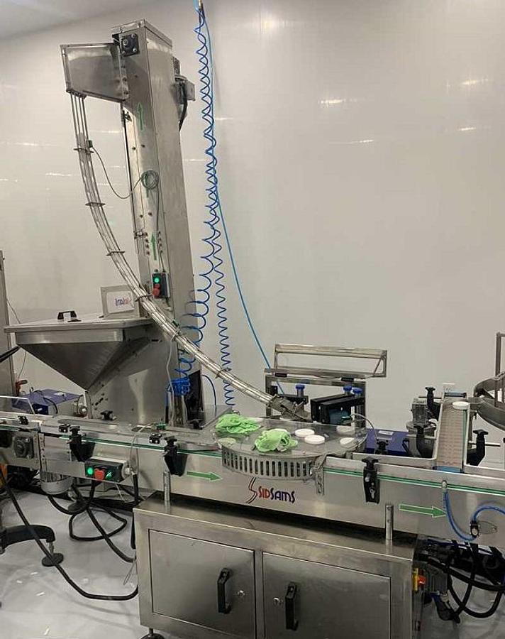 Used Fully Automated Nicotine Pouch Packaging Line