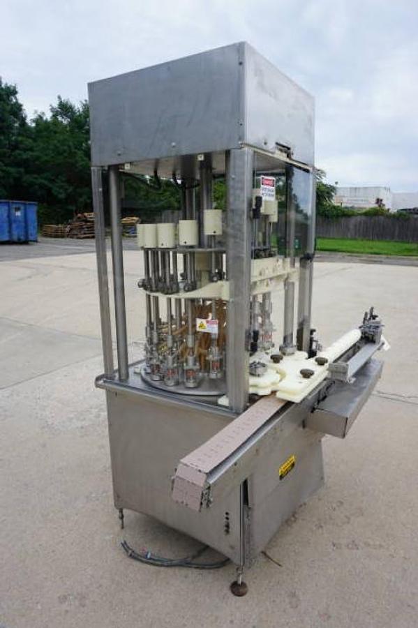 Used 18 Head Rotary Pressure Gravity Liquid Filling Machine