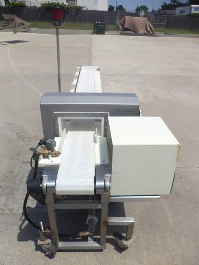 Used Safeline conveyorized metal detector, stainless steel