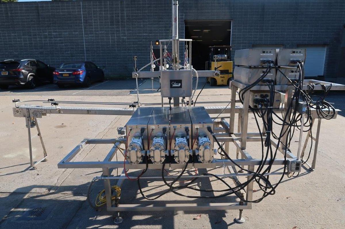 Used Oden Four Head Pump Style Positive Displacement Filler