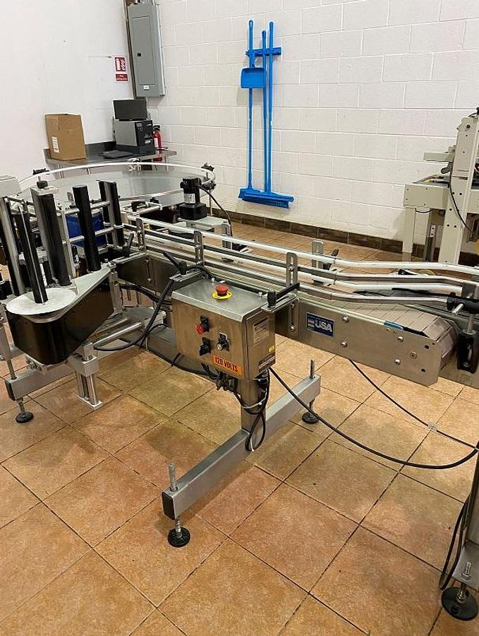 Used Quadrel “Moduline” Automatic Pressure Sensitive Wraparound Labeler