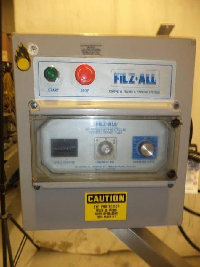 Used Kaps-All/Filz-All Automatic Gravity Overflow Liquid Filler