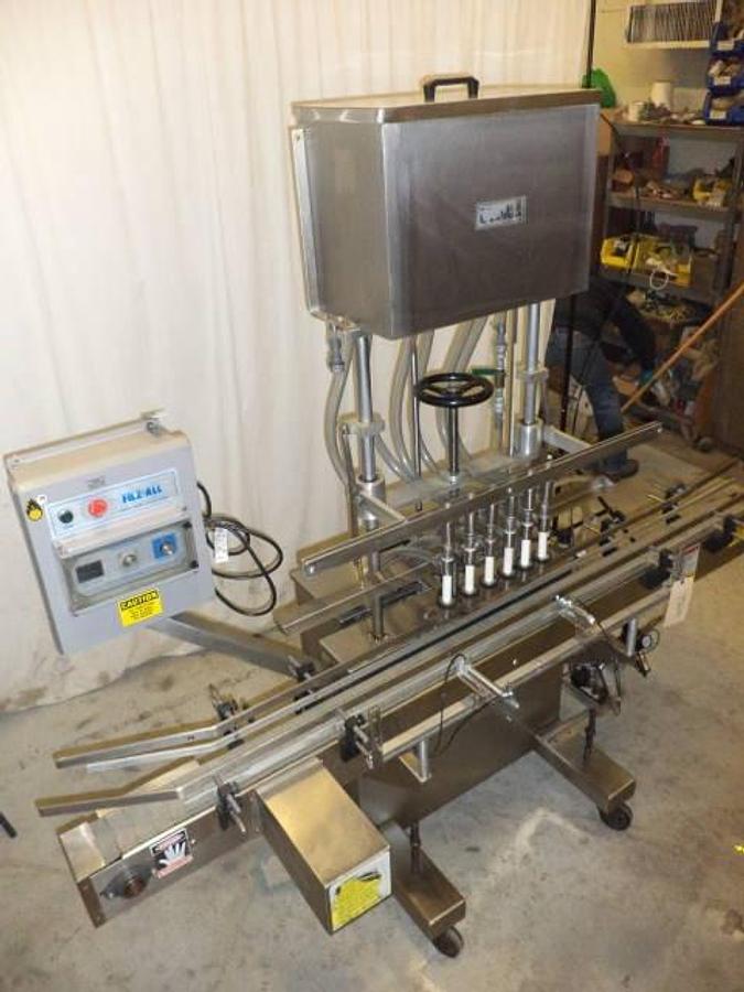 Used Kaps-All/Filz-All Automatic Gravity Overflow Liquid Filler