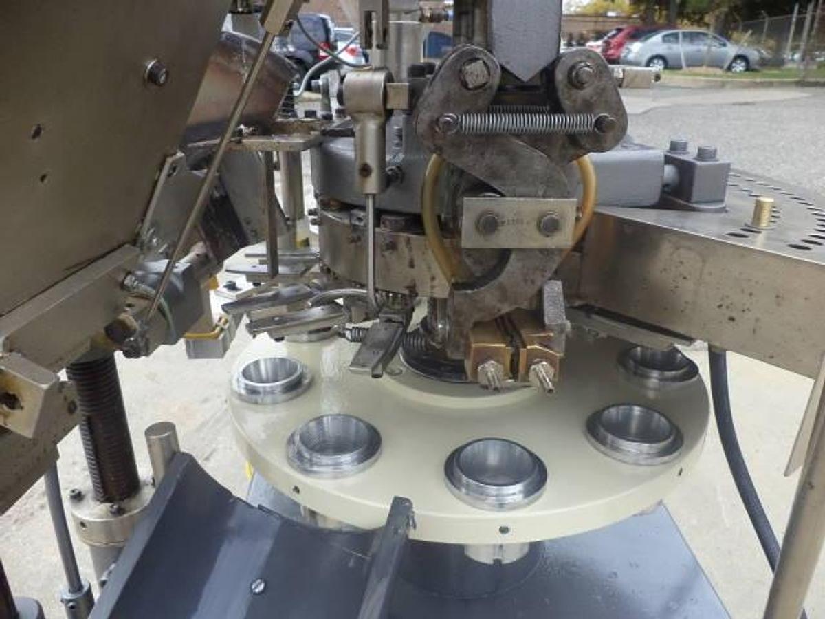 Used Comadis automatic plastic radiant heat tube filler