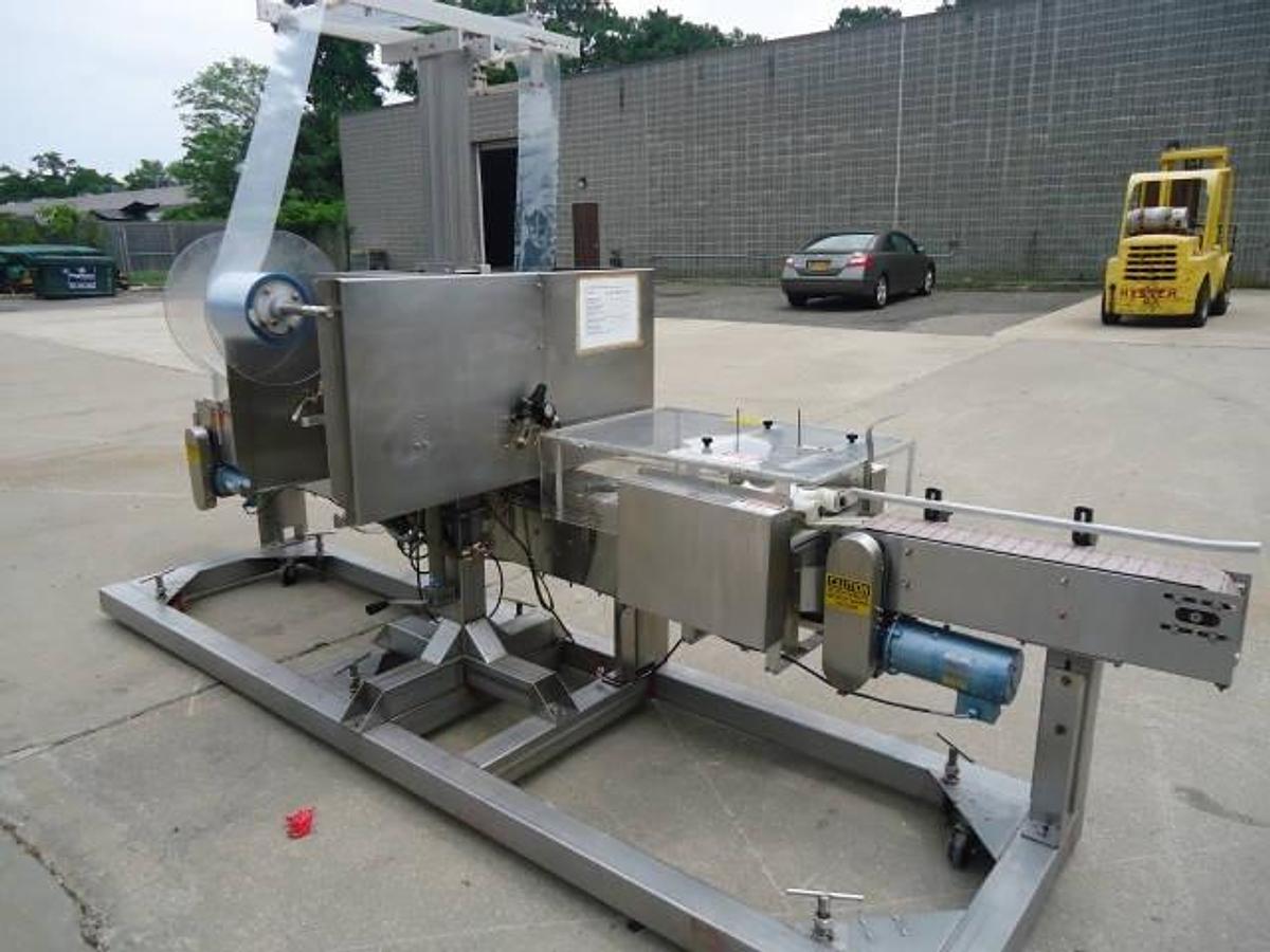 Used Axon Ez-300 Sleever/Bander With Shrink Tunnel