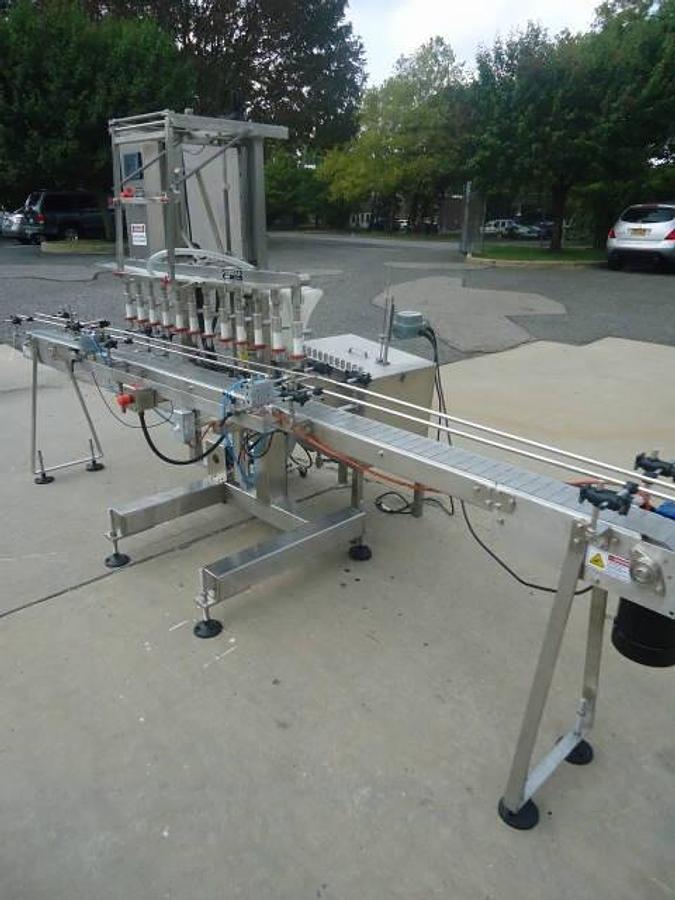 Used Filling Equipment Company Twelve Spout Straight Line Automatic Liquid Filler