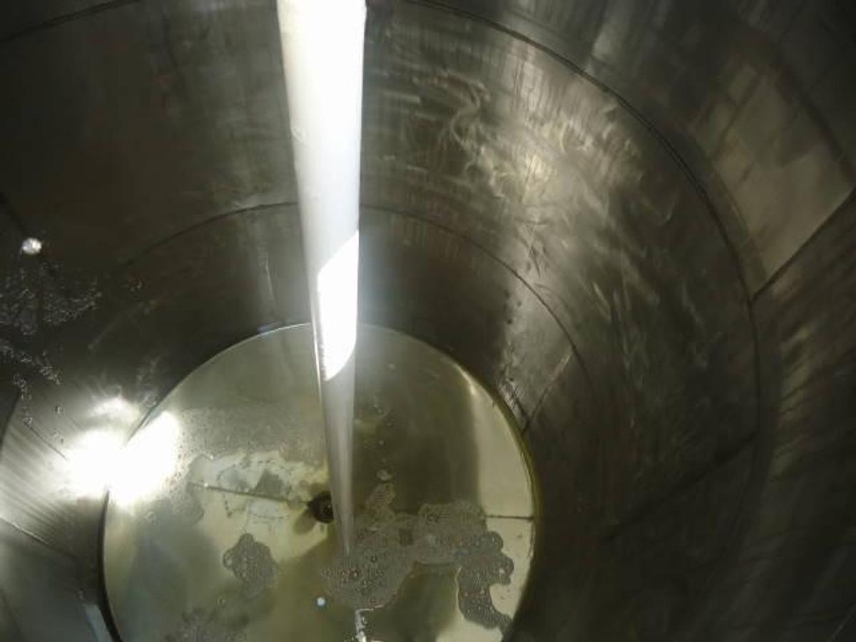 Used 2,000 Gallon stainless steel vertical tank, dished bottom