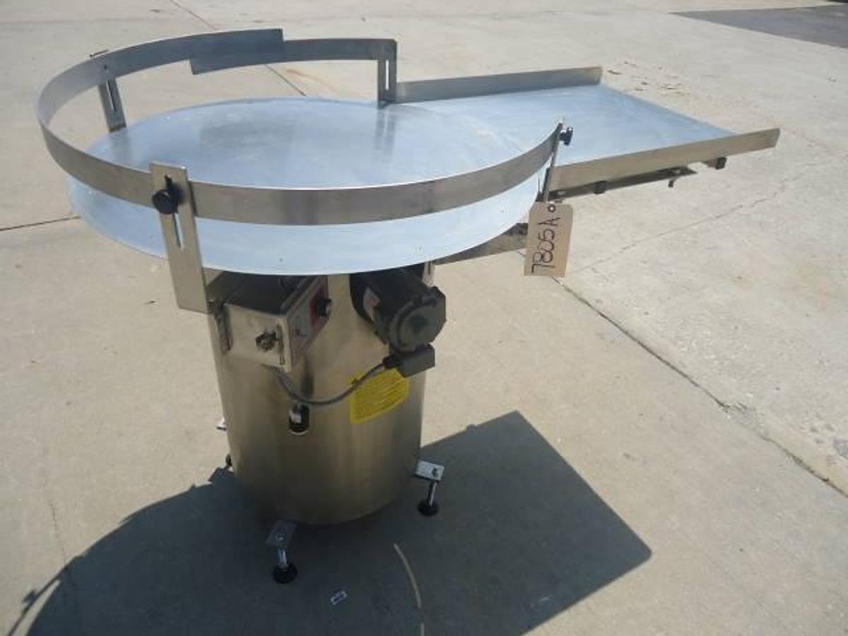 Used 36 Inch diameter Kaps All rotary unscrambling table, stainless steel base