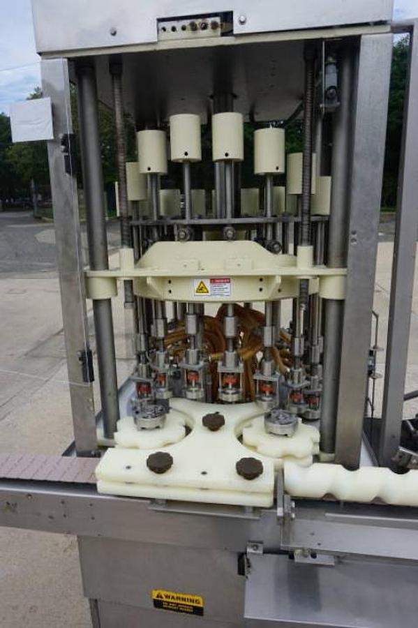 Used 18 Head Rotary Pressure Gravity Liquid Filling Machine