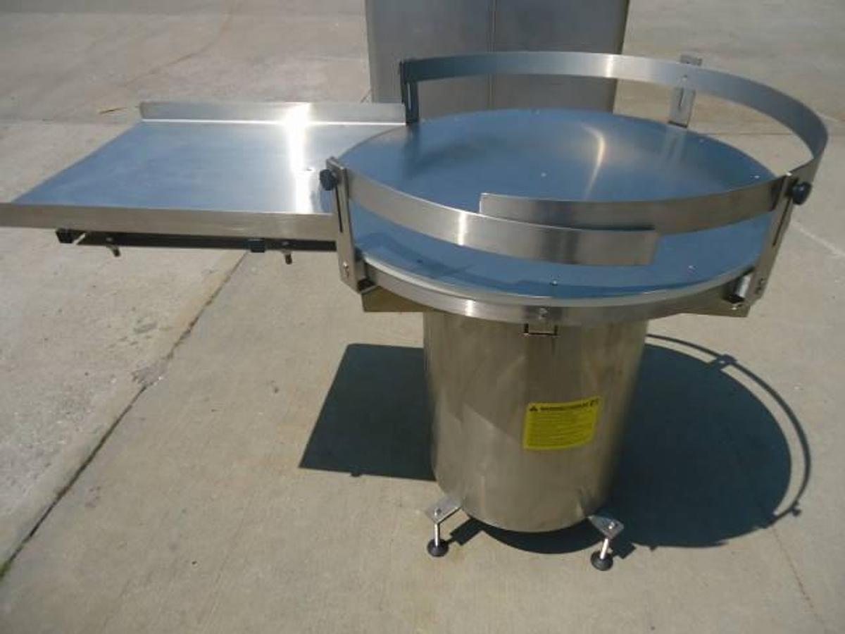 Used 36 Inch diameter Kaps All rotary unscrambling table, stainless steel base