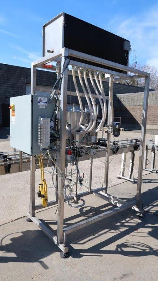 Used Apacks Six Head Automatic Sanitary Pressure Gravity Filling Machine, Expandable