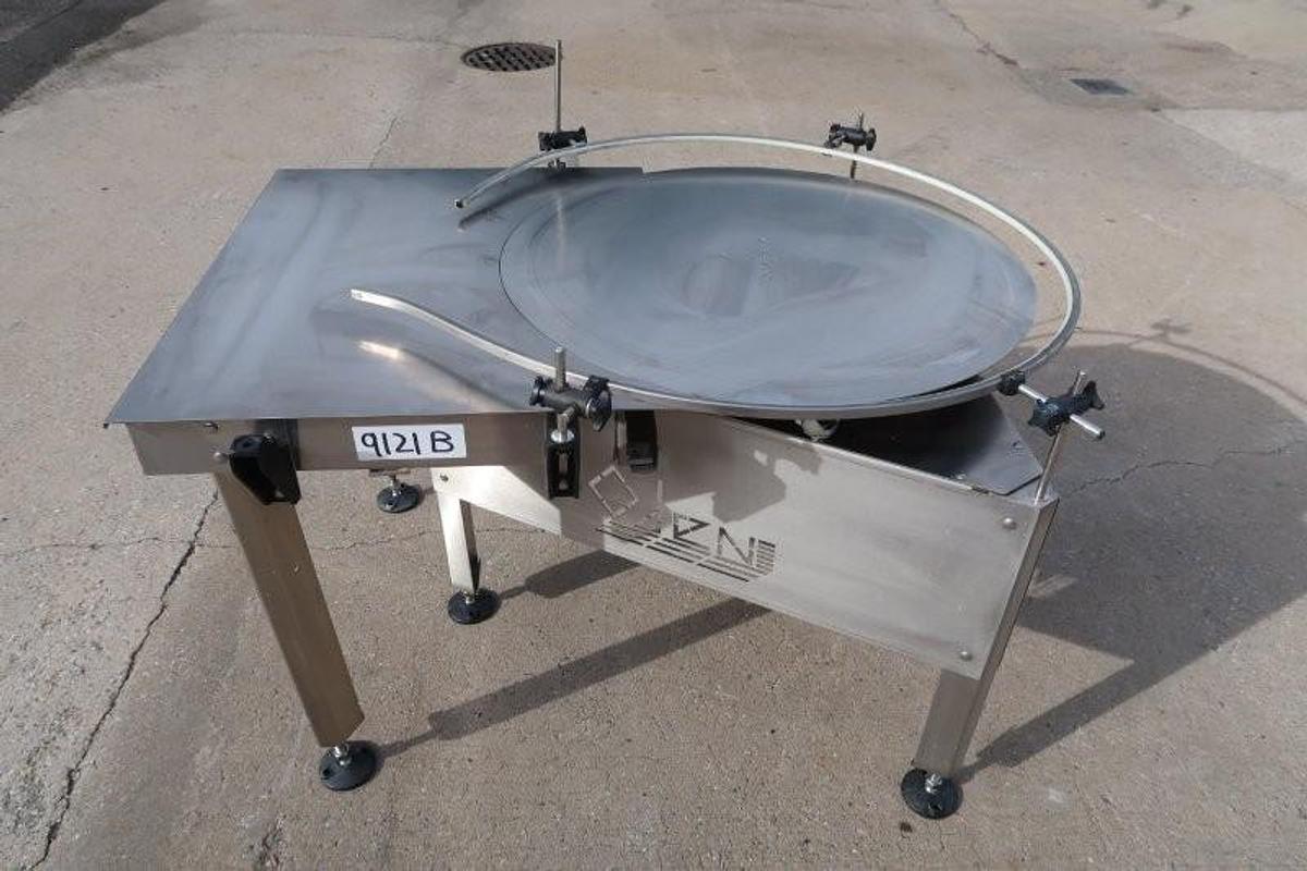Used Oden 36 In. Diameter Rotary Unscrambling/Accumulating Table, with Shelf