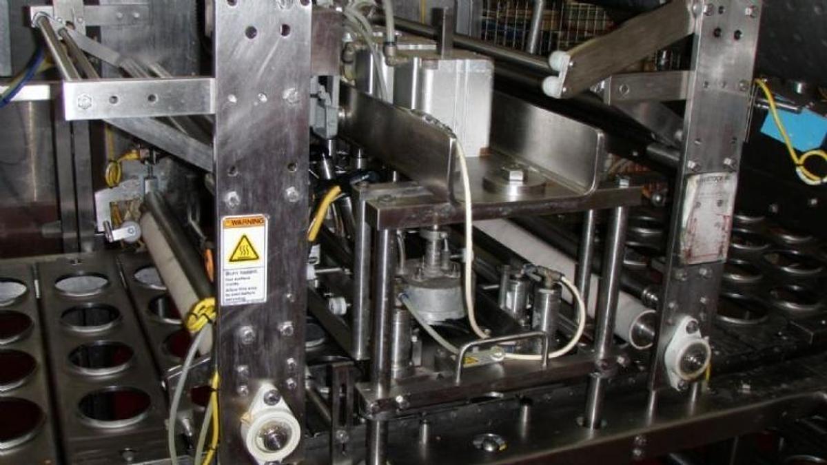 Used Osgood Four Lane Cup Filling System, 3.5 In. & 4.5 In. Diameter Tooling