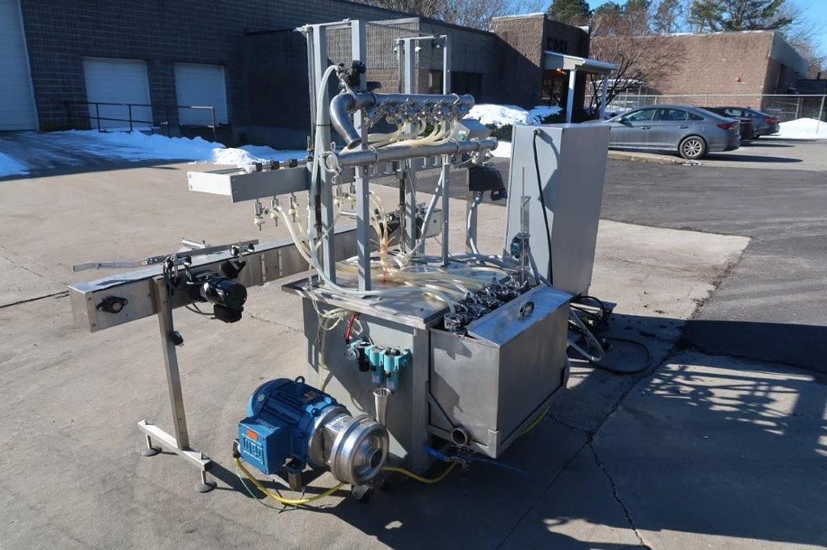 Used MRM/Elgin 8-Head Straightline Overflow Filling Machine