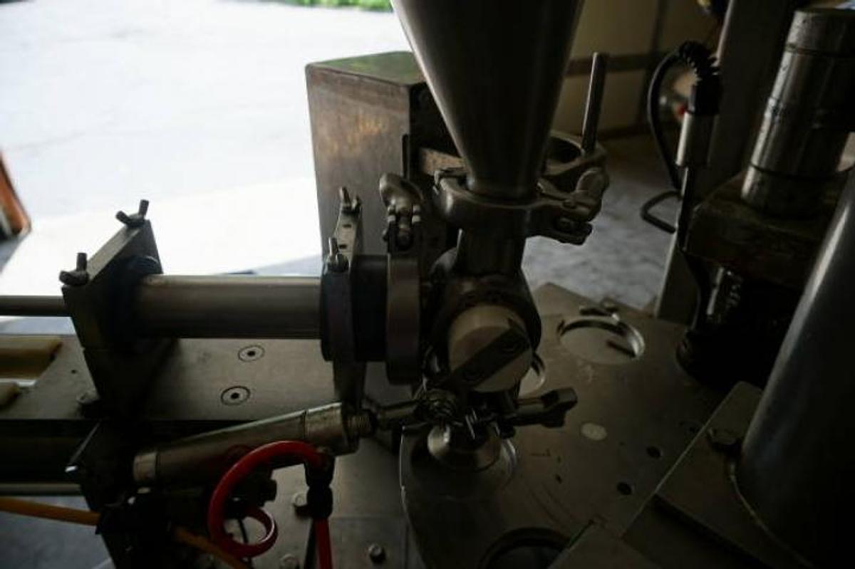 Used World Cup Model 8-12 Rotary Cup Filling/Sealing Machine, 45 Per Minute