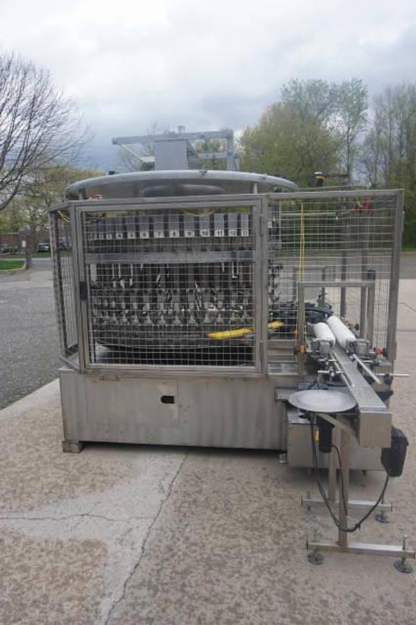 Used U.S. Bottlers 48 Valve Rotary Gravity Filling Machine, Last Filling Alcohol