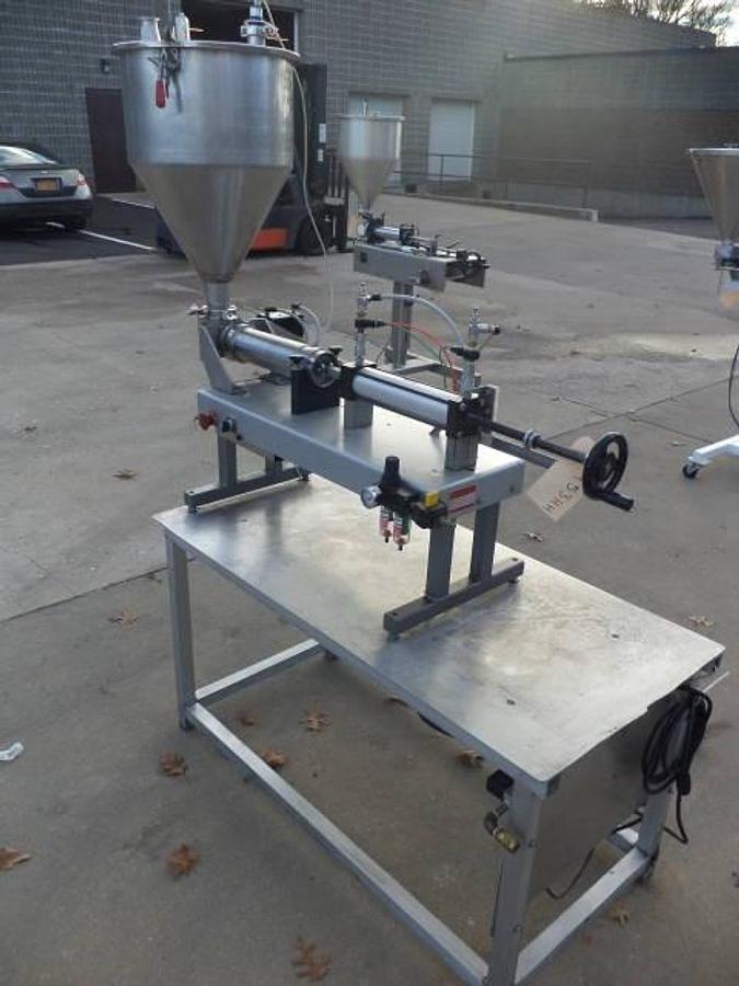 Used MRM/ELGIN Single Piston Air Operatd Filler, 60 Oz. Maxiumu Fill