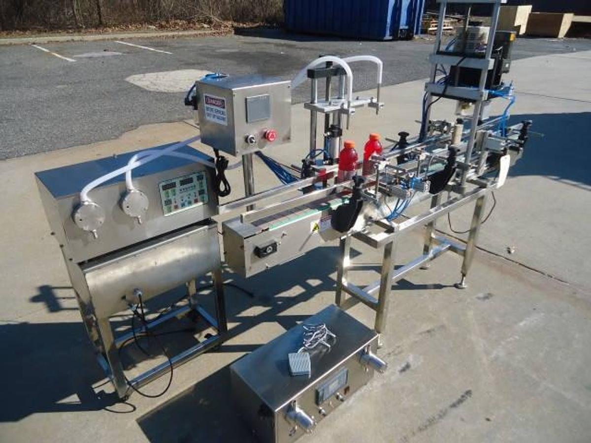 Used Ocean Packing Two Head Pump Style Stainless Steel Filling And Capping Machine
