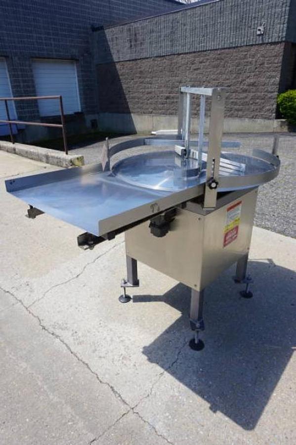 Used 36 In. Kaps-All Stainless Steel Rotary Table, with unscrambling shelf