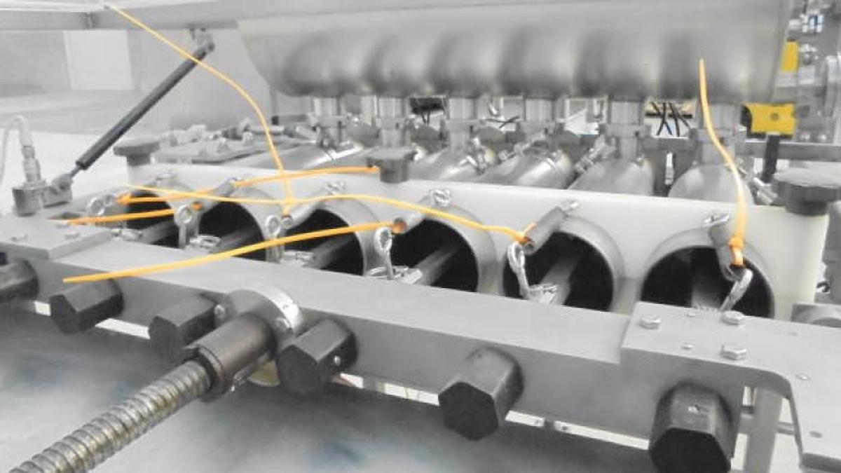 Used MRM/Elgin Six Piston Inline Filling Machine, 94 ounce pistons