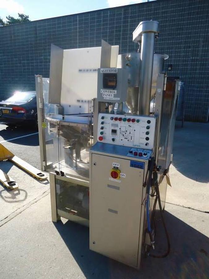 Used Unipac “Silver 80” Mascara & Lip Gloss Filling Machine