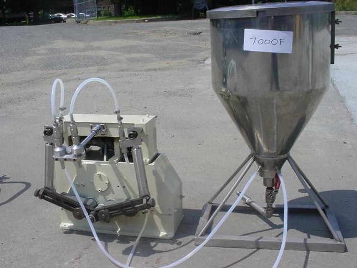 Used Two Spout Tabletop Piston Filler With Hopper
