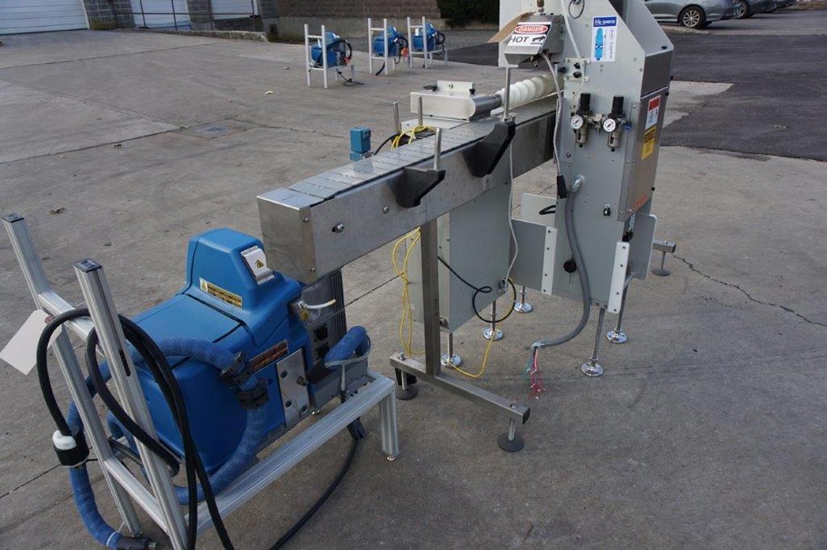 Used Creative Automation 401 Outserter, with Nordson Gluer