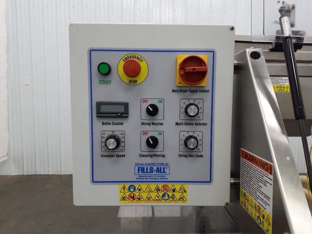 Used Kaps-All Four Piston Automatic Filler, 36 Oz. Pistons
