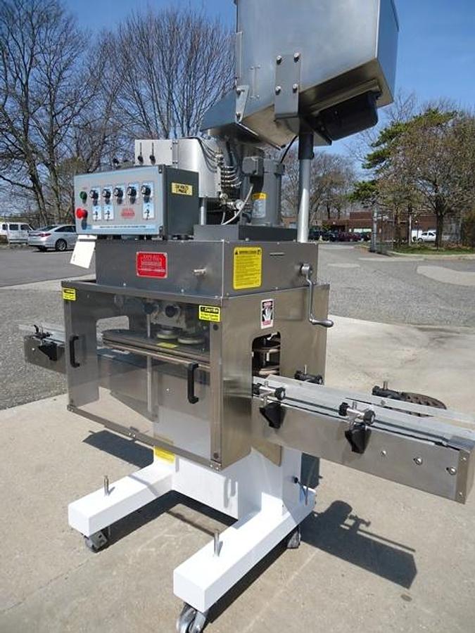 Used Kaps-All E4 Four Spindle Automatic Screw Capper, 80 Per Minute