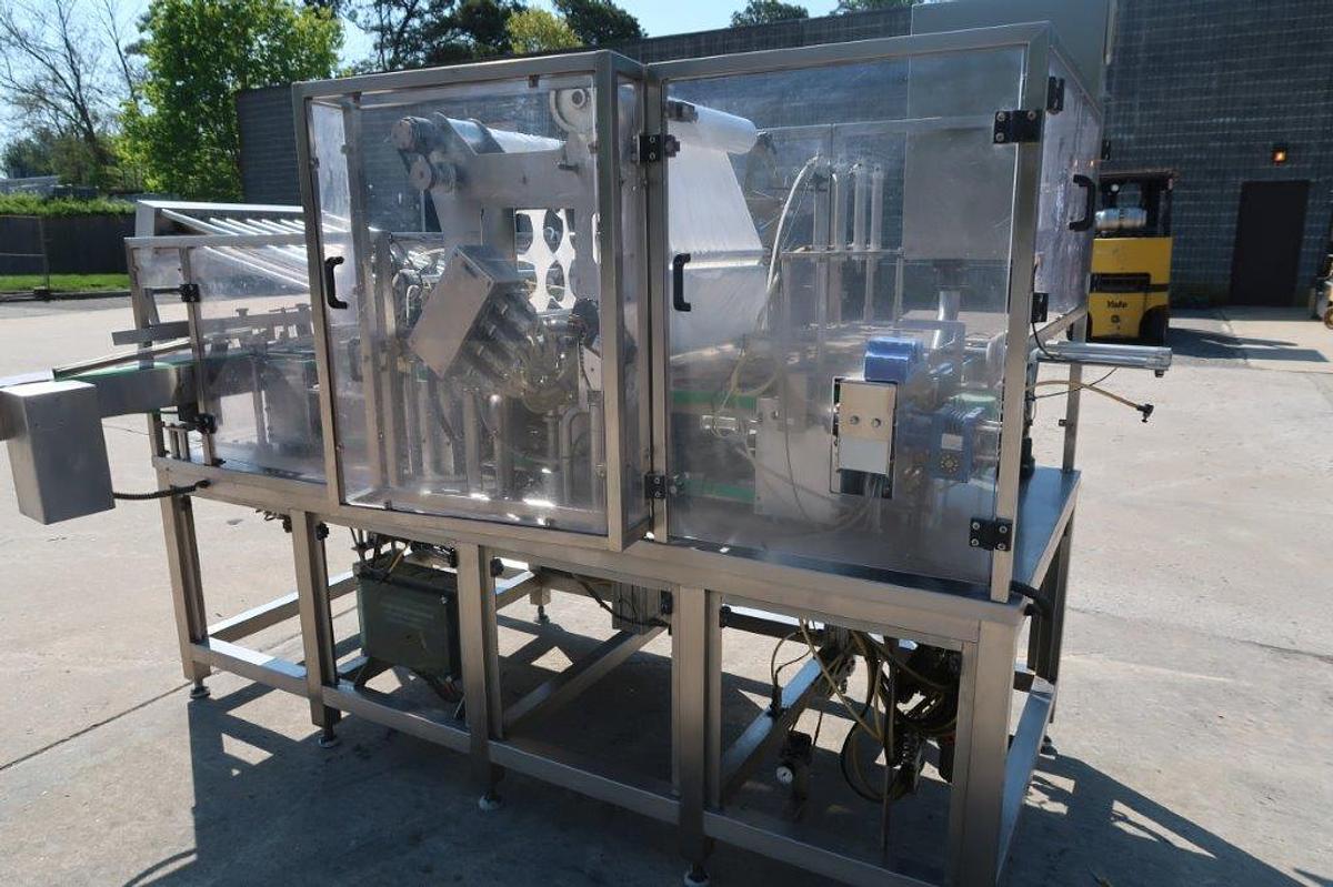 Used Packline PXG-4 Four Lane Stainless Cup Packaging Machine
