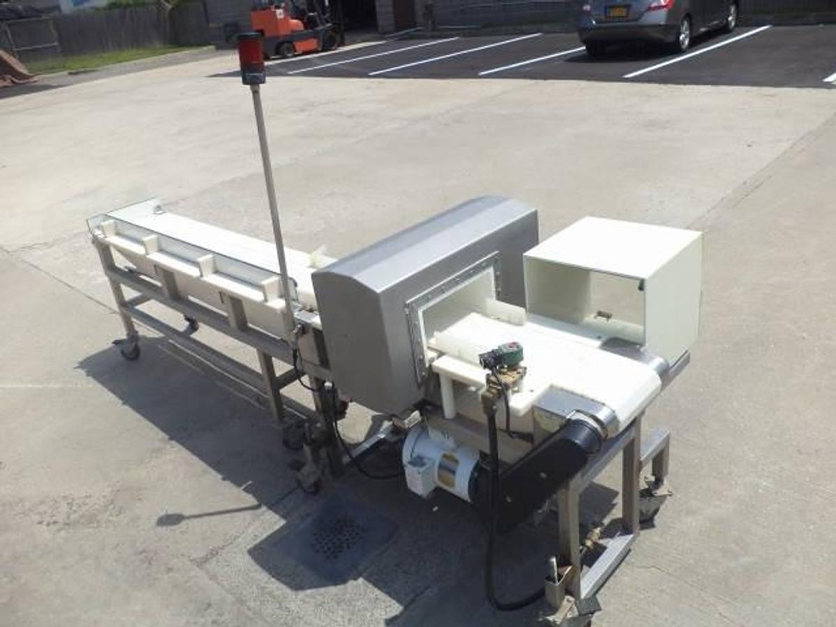 Used Safeline conveyorized metal detector, stainless steel