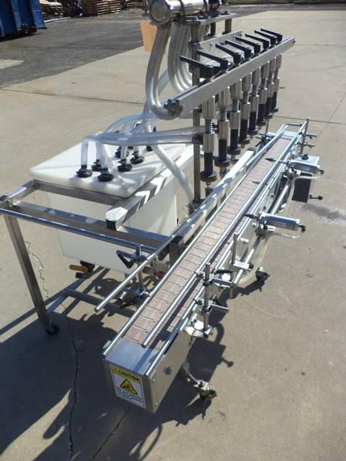 Used Packaging Dynamics Eight Spout Stainless Steel Portable Straight Line Liquid Filler, Explosion Proof