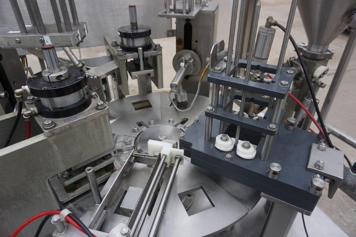 Used Modern Packaging MR Series Rotary Cup Filling and Sealing Machine