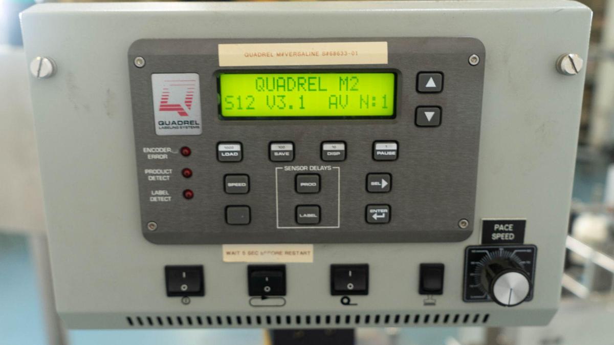 Used Quadrel VersaLine Spot/Wraparound Pressure Sensitive Labeler
