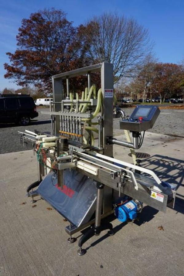 Used Accutek 8 Head Automatic Pressure Overflow Liquid Filling Machine, with Conveyor