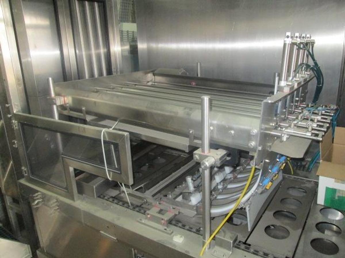 Used BWI Holmatic Opti-Fil four lane cup filling line