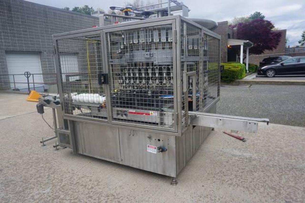 Used U.S. Bottlers 48 Valve Rotary Gravity Filling Machine, Last Filling Alcohol