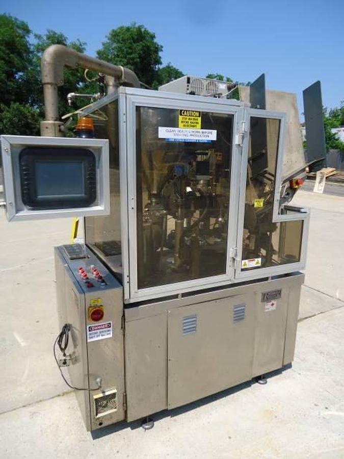 Used Comadis C100 automatic tube filler/sealer, high frequency sealing