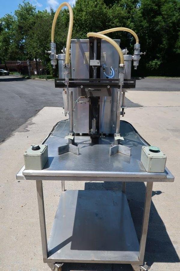 Used Filamatic DAB-32-2 Twin piston Table Top Piston Filler, 36 ounce pistons