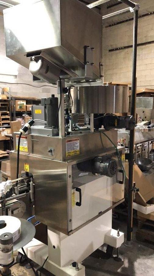 Used Kaps-All E-4 Four Spindle Capper With Conveyor