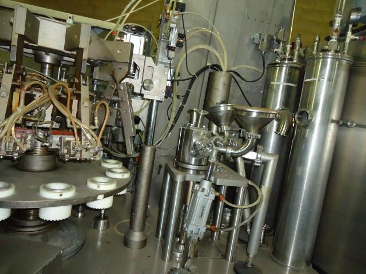 Used Unipac 120 Automatic Plastic Tube Filling/Sealing Machine