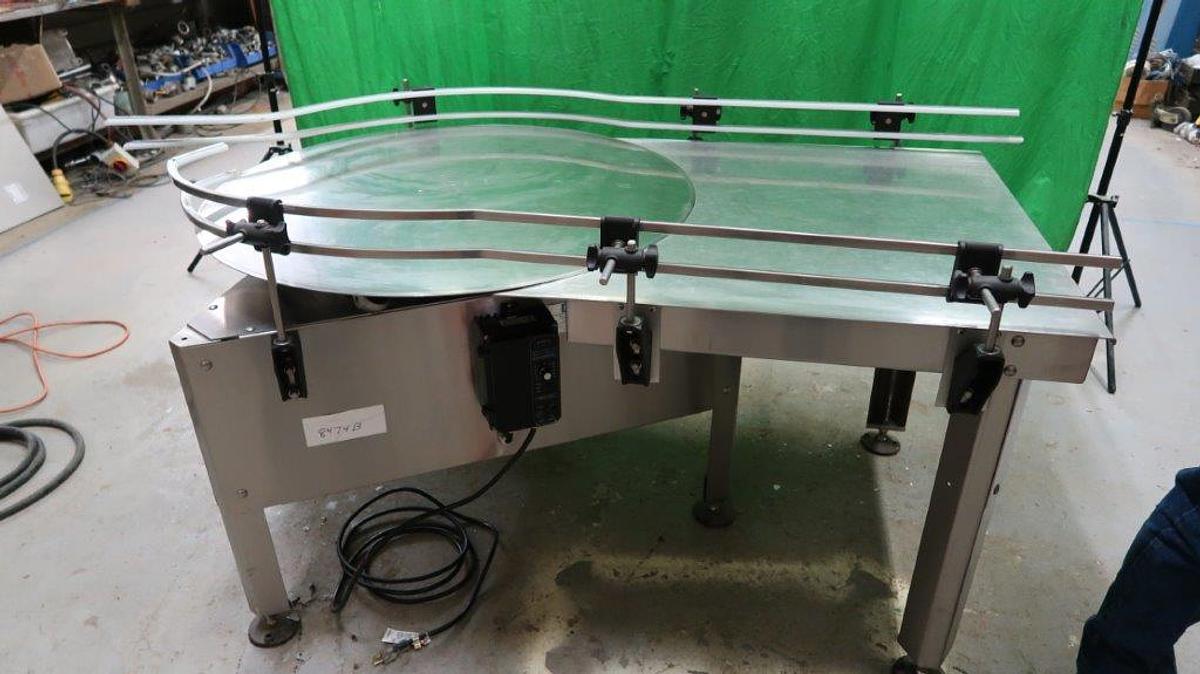 Used 40 In. Diameter E-PAK Stainless Steel Rotary Unscrambling/Accumulating Table with Shelf