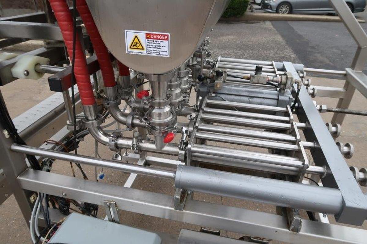 Used Inline Filling Systems Six Piston Hot Filler, Air Rinser