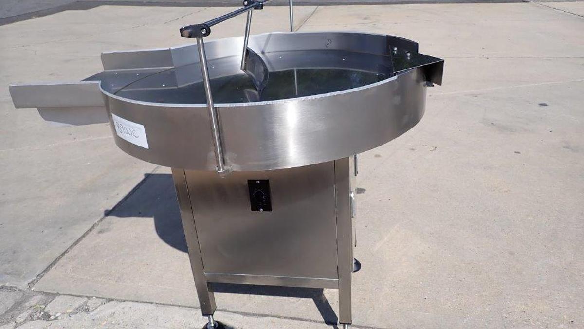 Used Metica 36 in. SS Rotary Unscrambling/Accumulating Table w/Shelf