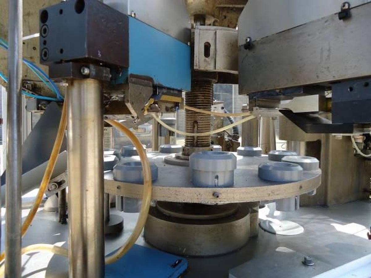 Used Comadis C100 automatic tube filler/sealer, high frequency sealing
