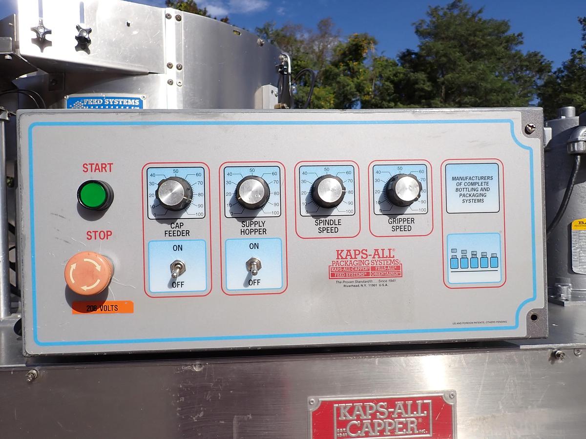 Used Kaps-All Model C Automatic Eight Spindle Capper, 200 Per Minute