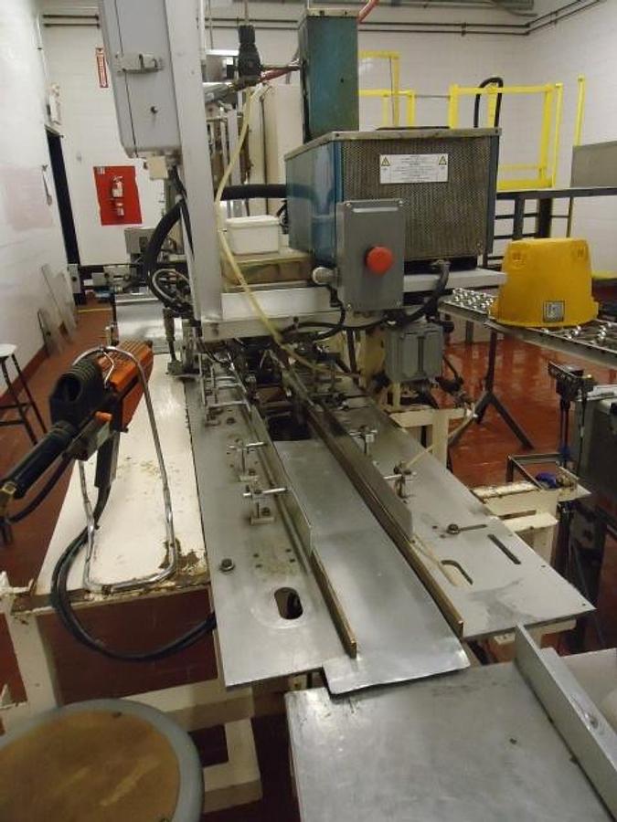Used Bartelt IM-6 Horizontal Pouch Packager With Hot Melt Cartoner